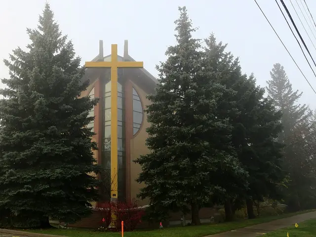 Exterior of Saint David's Church in Maple, Ontario, seen in morning fog.