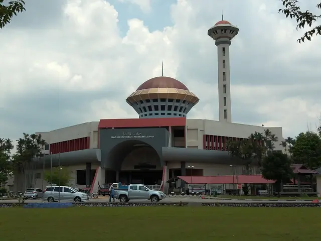 A mosque with a distinctive tower and dome