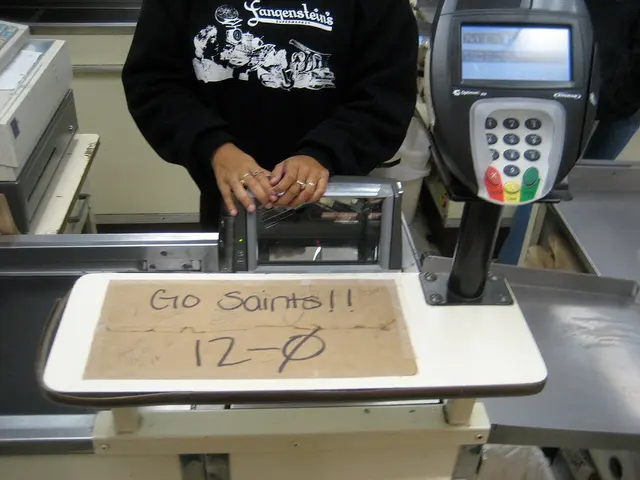 A grocery store checkout counter with a handwritten sign posted above it.