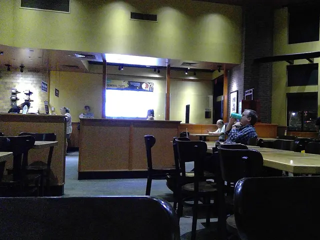 Interior seating area of a Pei Wei fast-casual Asian restaurant in Gainesville, Virginia.