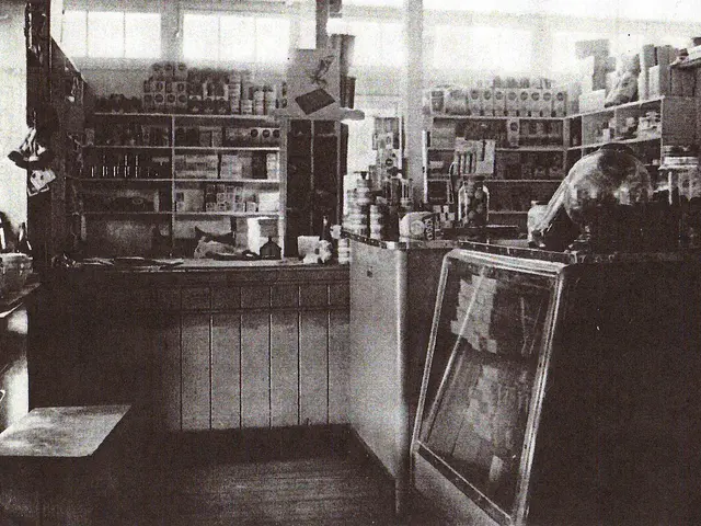 The interior of a historic grocery store with shelving and counters.