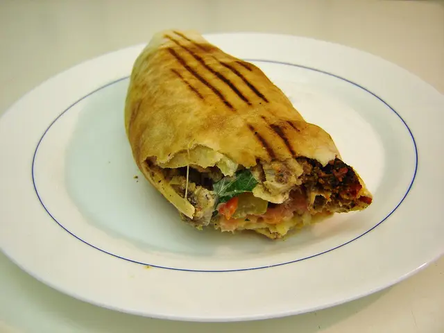 A shawarma sandwich wrap.