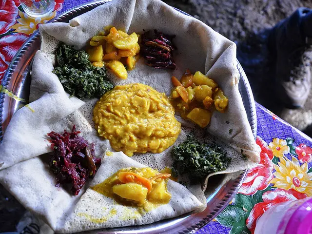 Ethiopian injera flatbread served with fasting-day dishes.