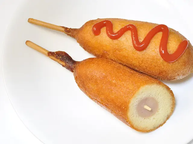 A corn dog on a stick.