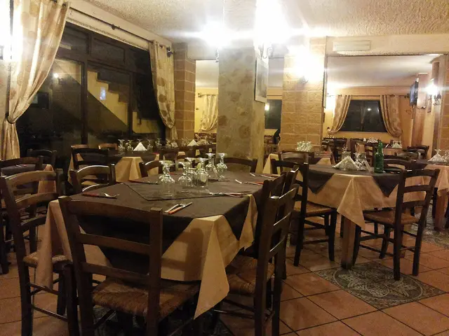 The storefront of a pizzeria in Partinico, Italy.