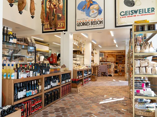 Interior of The Cheese Store of Beverly Hills showing shelves of wine, cheese, and gourmet goods.