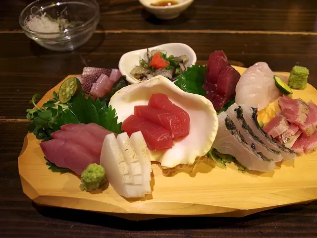 A combination plate of assorted sashimi.