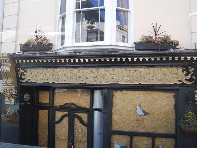 Exterior signage of The Quadrant Pub on Queens Road, Brighton.
