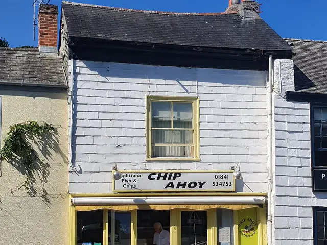 Exterior of an independent fish and chip shop in a Grade II listed building.