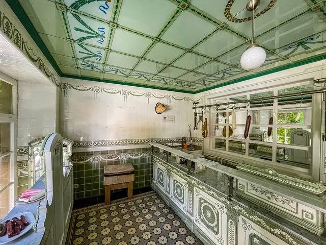 Interior of a reconstructed traditional butcher's shop with wooden fixtures and a display counter.