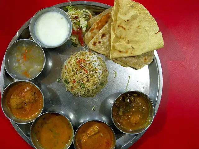 An Indian thali meal served on a metal platter in Darjeeling, India.