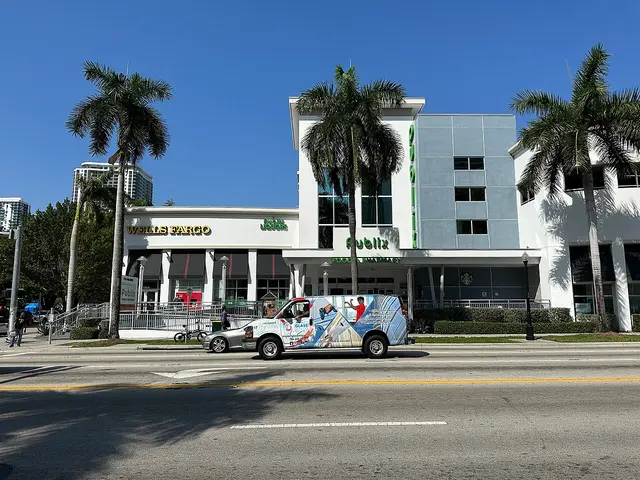 Exterior storefront of a Publix supermarket in Miami, Florida, with its sign above the entrance.