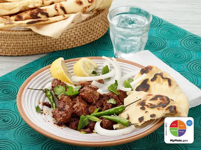 Shinwari lamb karahi, a traditional Afghan lamb dish with tomatoes, garlic, and ginger.
