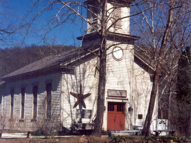 Exterior of the Christian Church, a white wooden church building in Metamora, Indiana.