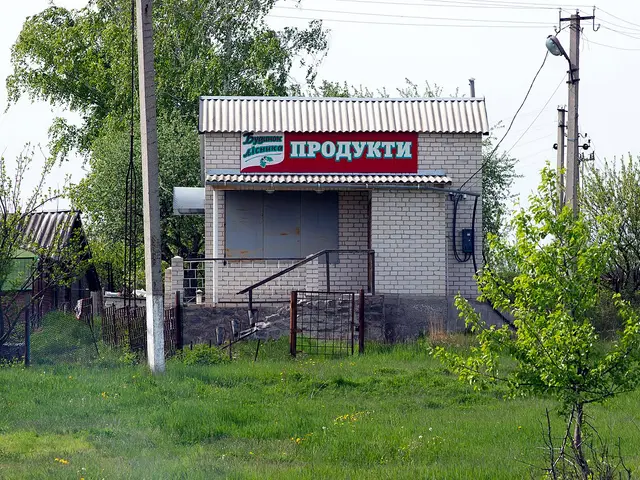 A small brick grocery store with a red Products sign in Ukraine