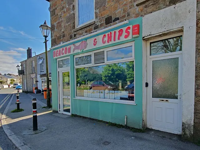 Shopfront of an independent fish and chip takeaway.