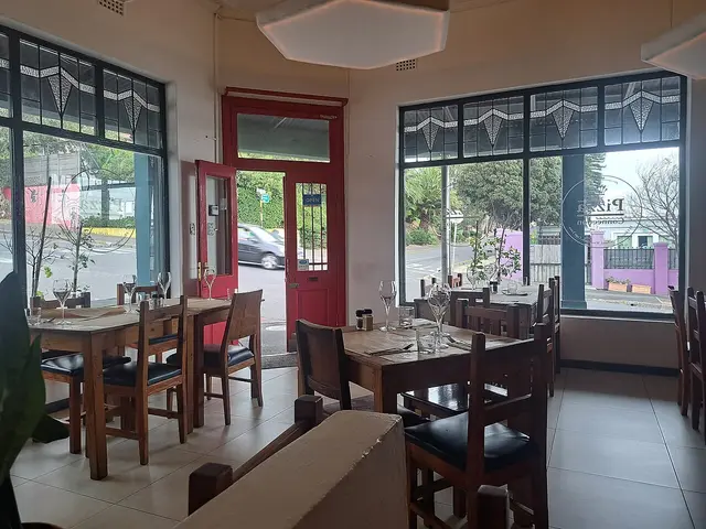 Interior dining area of the Pizza Connection restaurant in South Africa.