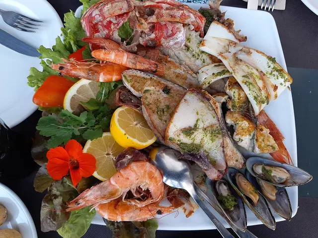 A platter of grilled seafood served at a restaurant harbour in La Palma.
