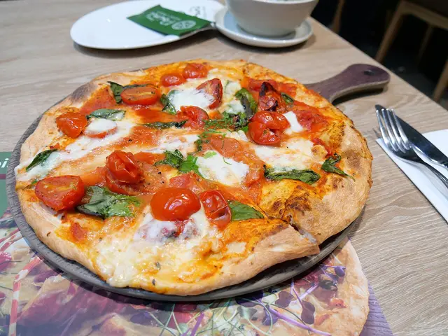 A margherita pizza served at a pizza restaurant in Hong Kong.