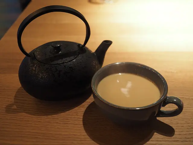 A cup of Indian tea served at an Indian restaurant.