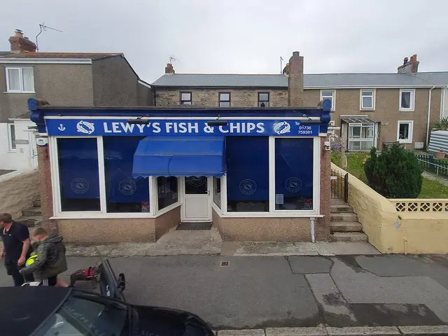 Shopfront of a small fish and chip takeaway.