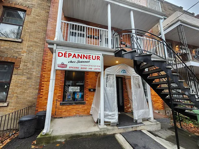 Exterior storefront of a Montreal depanneur (convenience store) named Chez Jeannot.