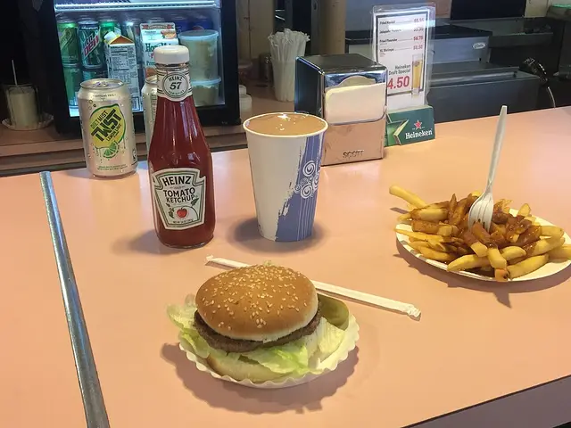 A classic burger and fries lunch served at an American diner.