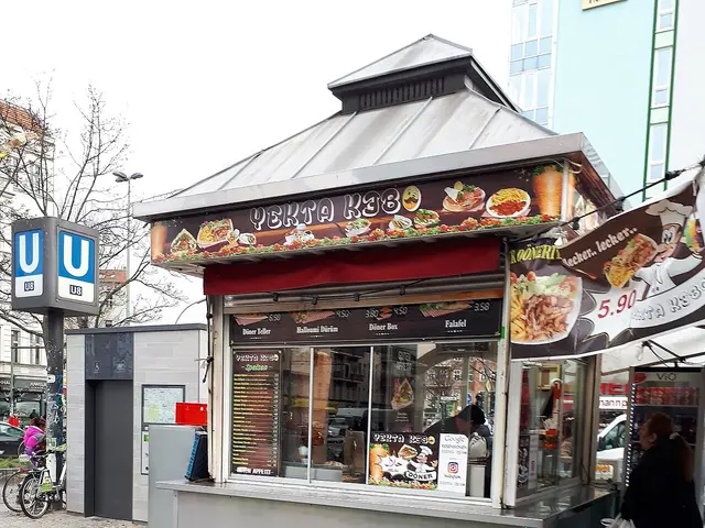 Exterior of a neighbourhood snack stand takeaway shop.