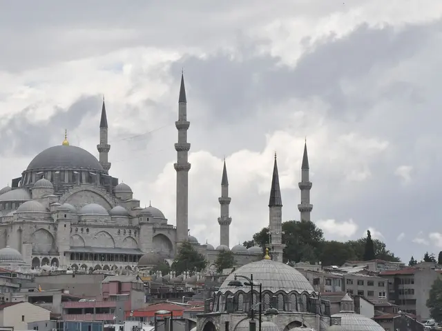 A mosque skyline with multiple minarets