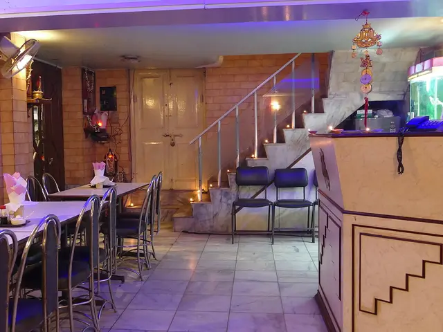 The interior dining room of a Chinese restaurant.