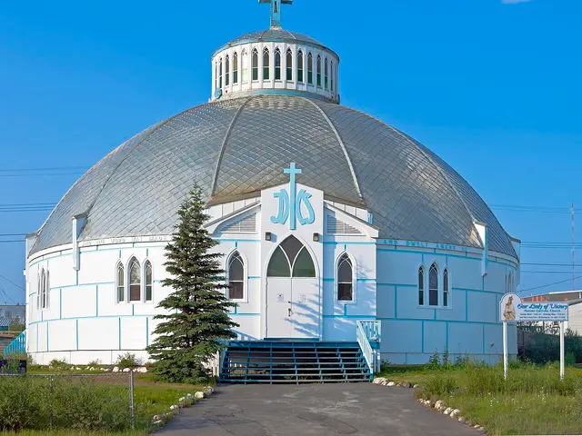 Front view of the dome-shaped Our Lady of Victory Church building in Inuvik, Northwest Territories.