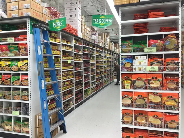 Pickles aisle inside an Indian grocery store in New Jersey, with jars and packaged goods on shelves.