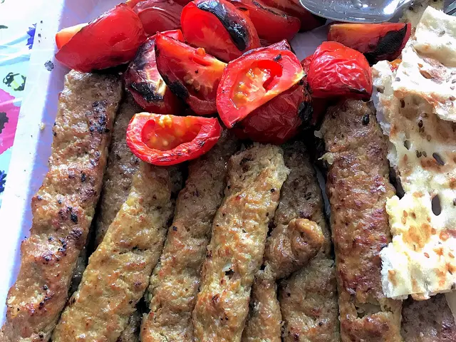 Persian koobideh kebab, ground meat skewers grilled over charcoal.