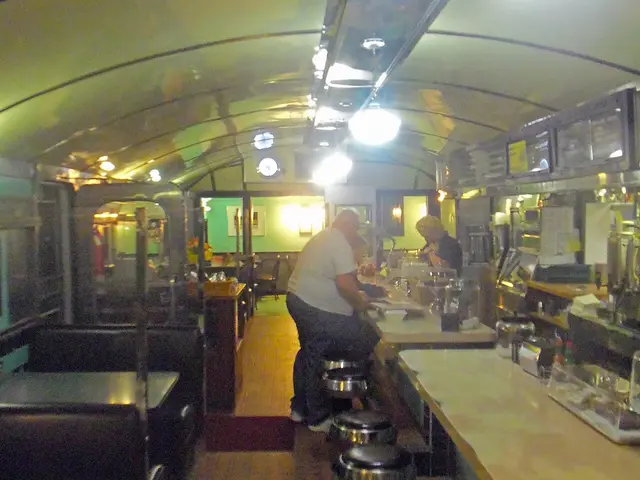 Interior of the Village Diner in Red Hook, New York, with booth seating.