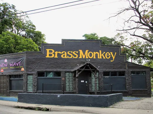 Facade of the former Jacala Restaurant building in San Antonio, Texas, featuring a faux bois sculpture.