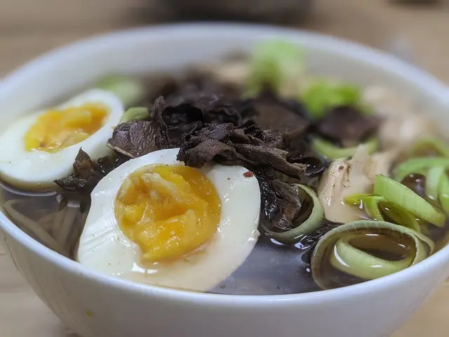 A bowl of ramen noodle soup.