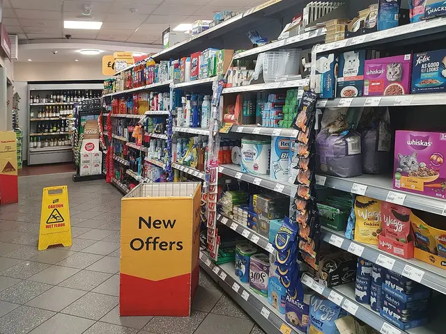Interior of a Morrisons Daily convenience store showing stocked shelves of packaged goods.