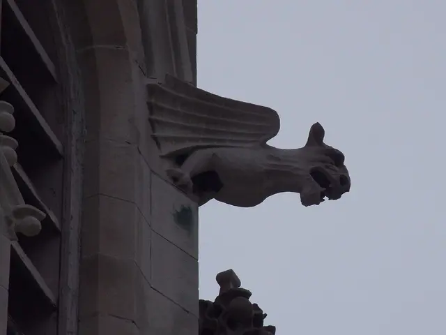 Detail of a spire and carved gargoyle on the exterior of Saint Mary Catholic Church in Indianapolis, Indiana.