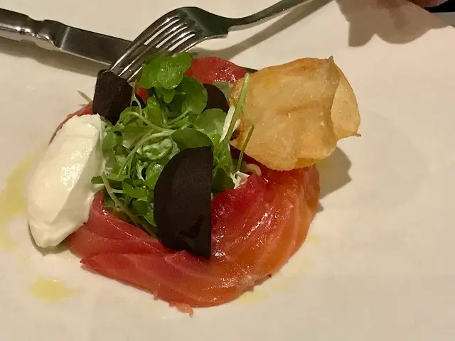 A plate of cured Atlantic salmon served at a French bistro.