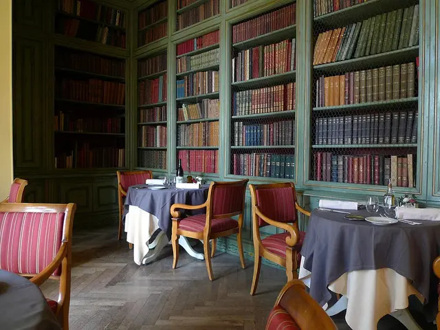 A restaurant dining room set with tables and chairs.