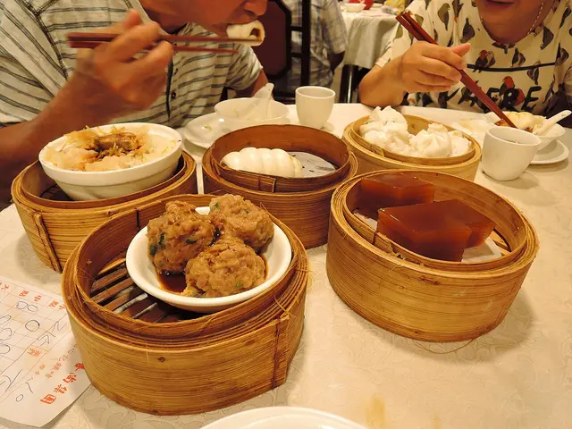 An assortment of dim sum dishes served at a Chinese restaurant.