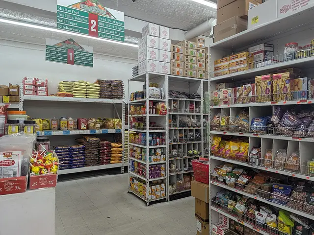Shelves stocked with packaged goods inside Patel Brothers, an Indian grocery store in Waltham, Massachusetts.
