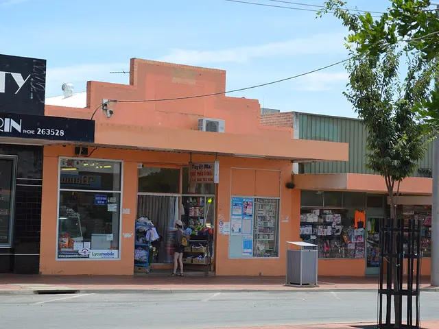 The orange storefront of an Asian grocery store on a small-town street in Victoria, Australia