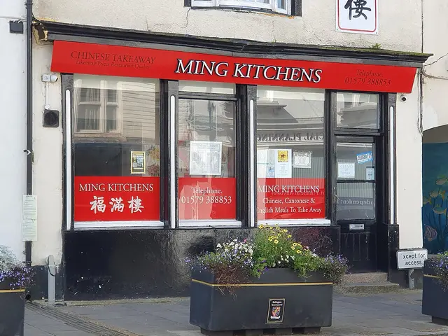 Storefront of a small-town takeaway food shop.