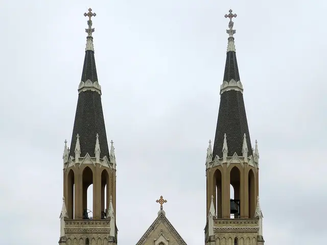 Exterior of Saint Stanislaus Kostka Church, a brick church building in Bay City, Michigan.