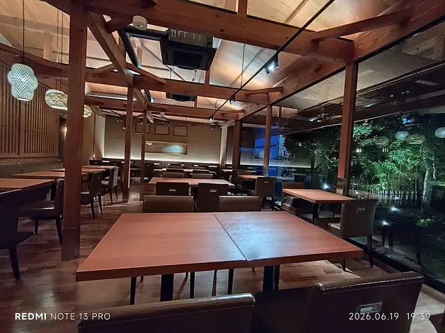 Interior dining area and furniture of a restaurant on Nagatsuji Street in Kyoto, Japan.