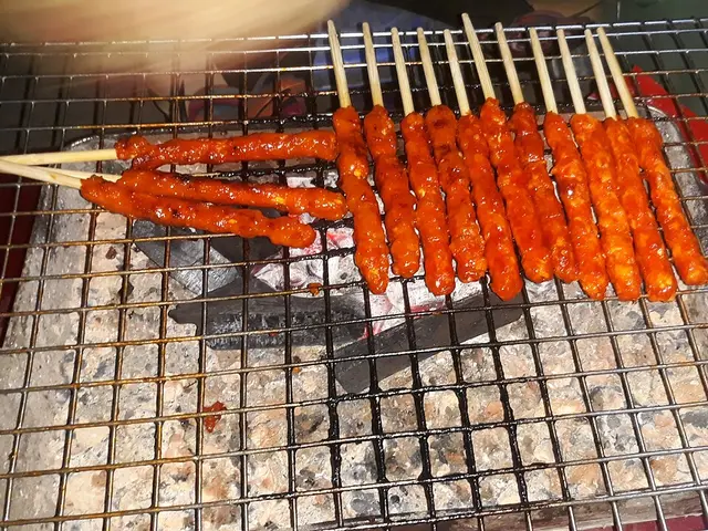 Vietnamese grilled pork skewers (nem nuong).