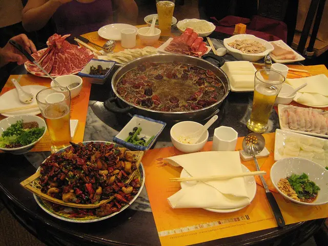 A plate of Sichuan-style Chinese food served in a Hong Kong restaurant.