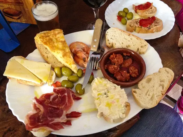A mixed plate of Spanish tapas.