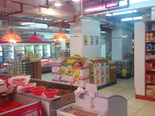 Interior of the Kai Bo Food Supermarket on Wan Chai Road in Hong Kong, showing grocery aisles.